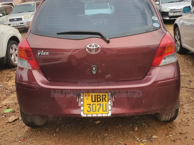 Toyota Vitz 2010 Maroon - 1