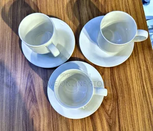 Off-White Cup and Saucer Set