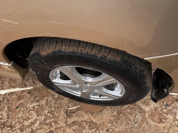 Toyota Allex 2006 Gold - 1