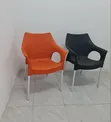 Brand New Plastic Chairs with Arms - 2