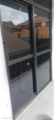 Sliding Door with Reflective Black Glass - 1