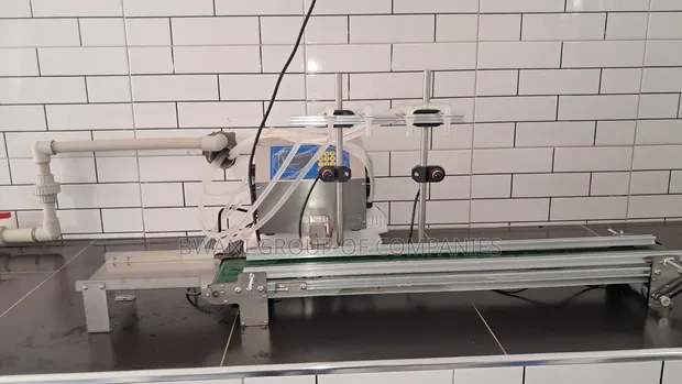 Brand New Semi-Automatic Bottle Filling Machine - 1