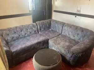 Used L-Shaped Sofa Chair in Grey