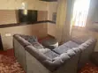 Used L-Shaped Sofa Chair in Grey - 2
