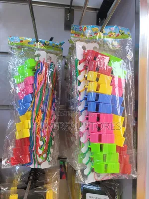 Packet of Colorful Plastic Toy Whistles with Lanyards