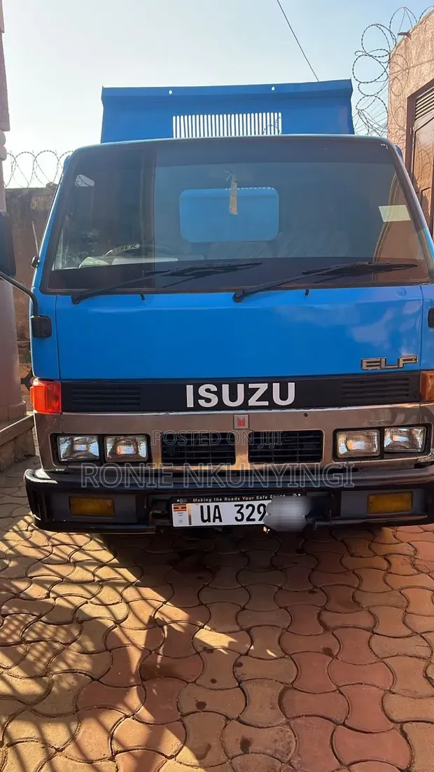 Isuzu Elf Dump Truck - 1