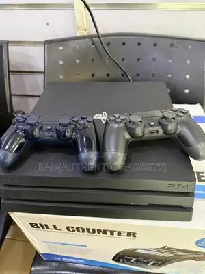 UK Model PS4 Pro with 10 Games, 2 Controllers