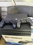 UK Model PS4 Pro with 10 Games, 2 Controllers - 1