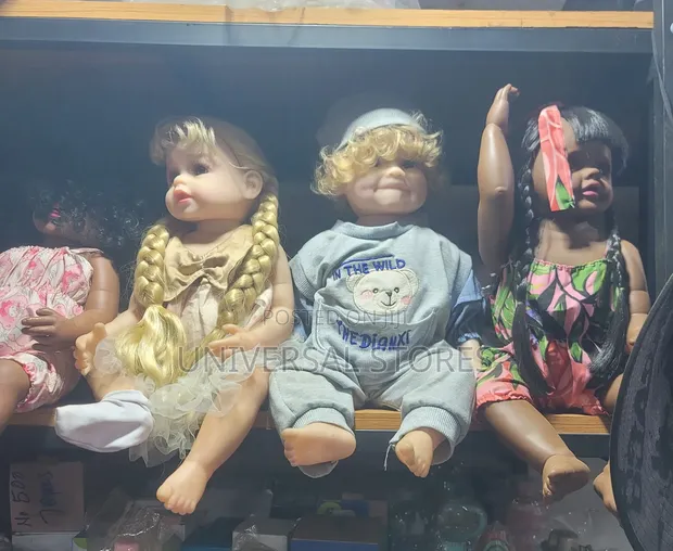 Realistic Baby Doll with Curly Blonde Hair - 1