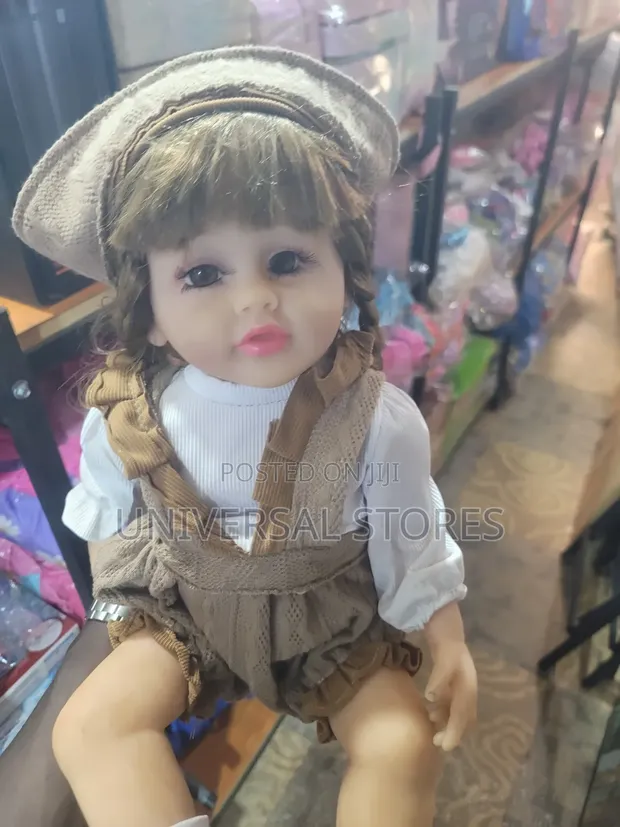 Realistic Baby Doll with Curly Blonde Hair - 1