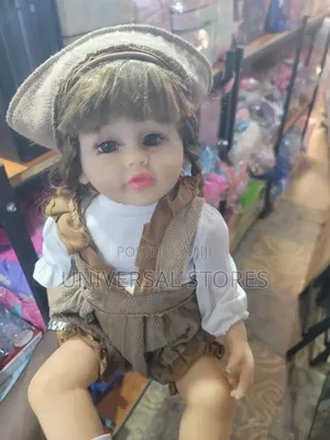 Realistic Baby Doll with Curly Blonde Hair