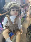 Realistic Baby Doll with Curly Blonde Hair - 2