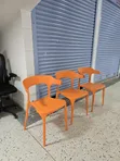 Crown Express Stackable Plastic Chairs with Armrests - 1