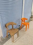 Curvex Orange Plastic Chairs with Armrests - 2