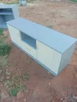 Brand New Wood-Mode TV Stand - 1