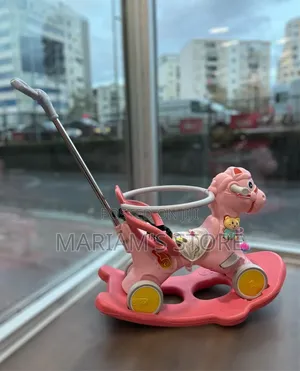 Kids' 4-in-1 Rocking Horse and Ride-on Toy with Push Handle
