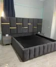 Upholstered Bed with Gold Strips and Side Tables - 2