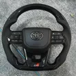 Toyota GR Sport Carbon Fiber Steering Wheel - 1