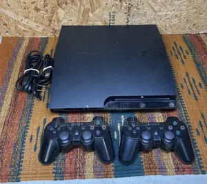 Sony PlayStation 3 Slim 250GB with 2 Controllers