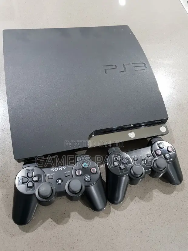 PlayStation 3 Slim with 15 Games and Accessories - 1