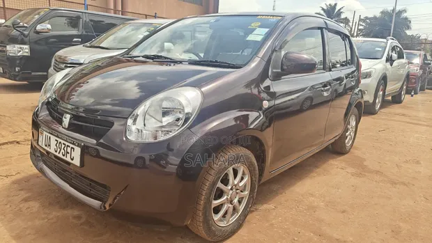Toyota Passo 2011 Maroon - 1