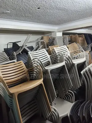 Brand New Monopolistic Plastic Dining Chairs (Set of 4)
