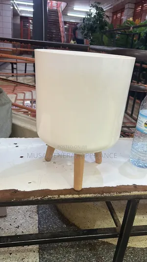 Cylindrical White Planter with Wooden Legs