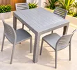 Brand New Stackable Plastic Outdoor Table and Chairs Set - 1