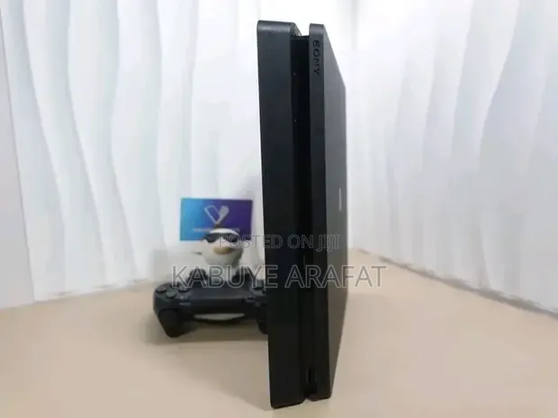 PS4 Slim Console Chipped with 10 Games - 1
