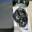 PS4 Slim Chipped Console with 2 Controllers & 12 Games - 2