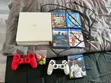 White PS4 Slim Console with 2 Controllers - 1