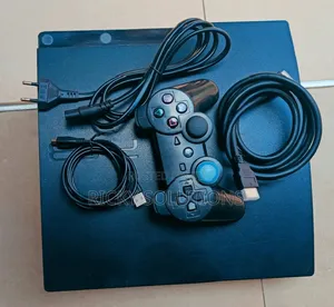 Playstation 3 Slim with 12 Games, 2 Controllers