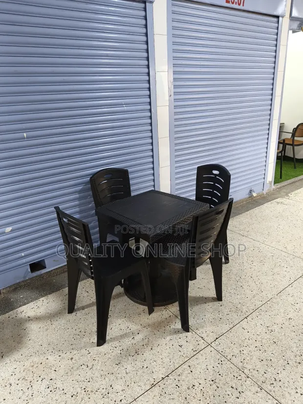 Plastic Pedestal Base Table and 4 Chairs - 1