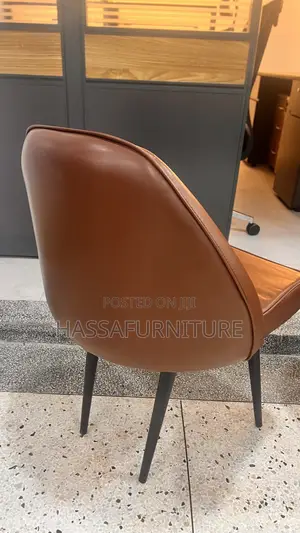 Brand New Leather Dining Chairs with Metallic Stands