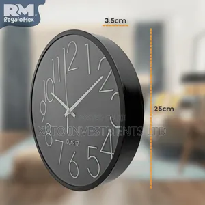 Modern Black Quartz Wall Clock With Silver Markers