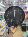 Modern Black Quartz Wall Clock With Silver Markers - 4