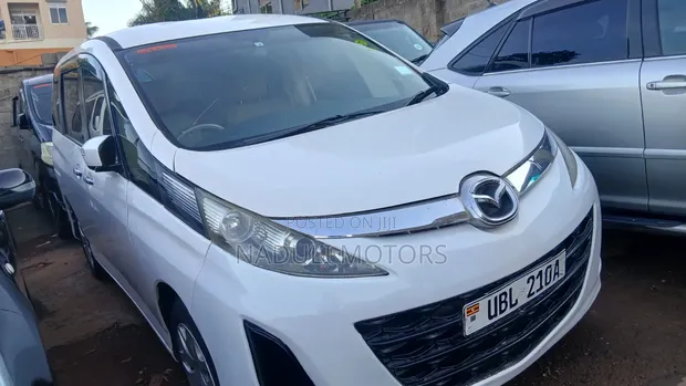 Mazda Biante 2010 White - 1