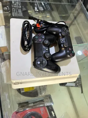 PS4 Slim 500GB with 8 Games & Two Controllers