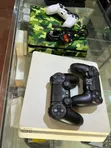 PS4 Slim 500GB with 8 Games & Two Controllers - 2