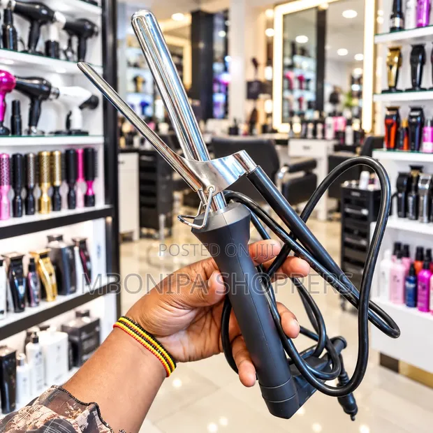 Electric Hair Curler & Styling Iron - Up to 200°C - 1
