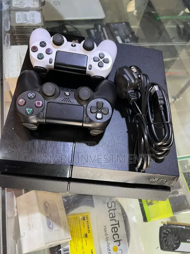 PS4 Standard Console with 2 Controllers & 8 Games - 1