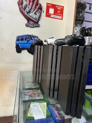 PS4 Pro 1TB with 2 Controllers & 15 Games