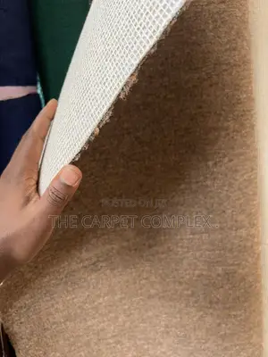 Beige Woolen Carpet - UGX 30,000/sqm