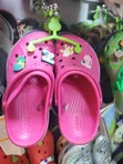 Hot-Pink Crocs Clogs with Shoe Charms - 1