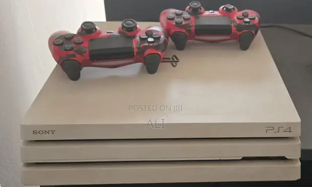 PlayStation 4 Slim (Used) - 1