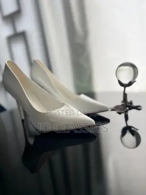 White Patent Red Sole Stiletto Pumps - Size 39