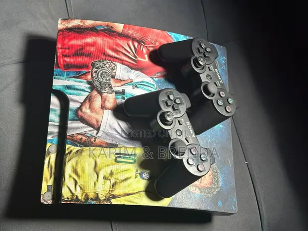 PlayStation 3 Slim with 10 Games & 2 Controllers - 1