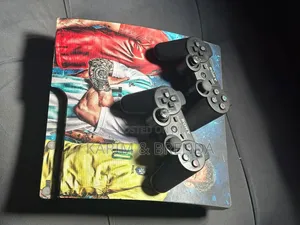 PlayStation 3 Slim with 10 Games & 2 Controllers