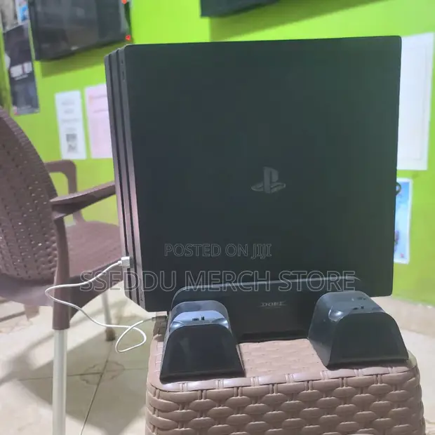 PS4 Pro 2TB with 40 Games & 15 Discs + Cooling Stand - 1