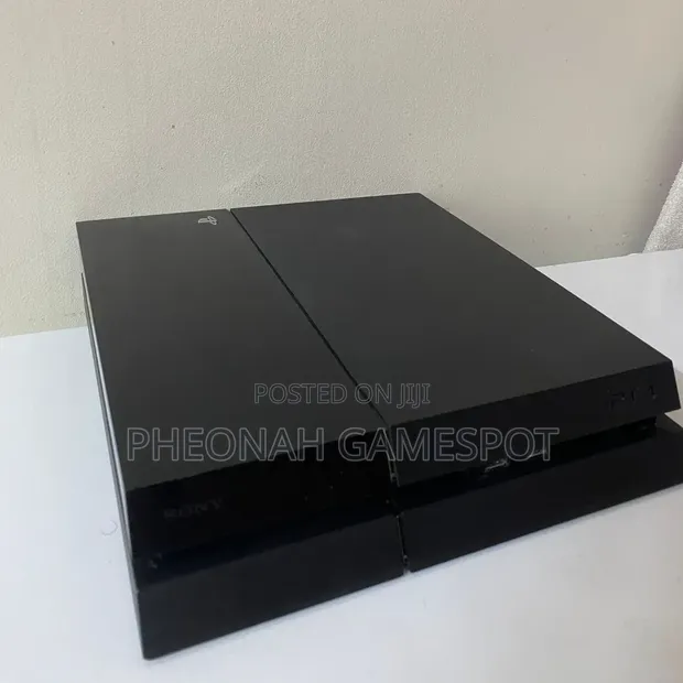 Playstation 4 Standard (PS4 Fat) Chipped Console with 12 Games & 2 Controllers - 1